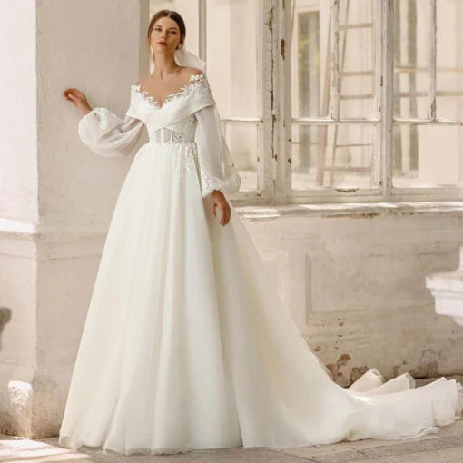 Robe De Mariée Princesse Manche Longue Dentelle